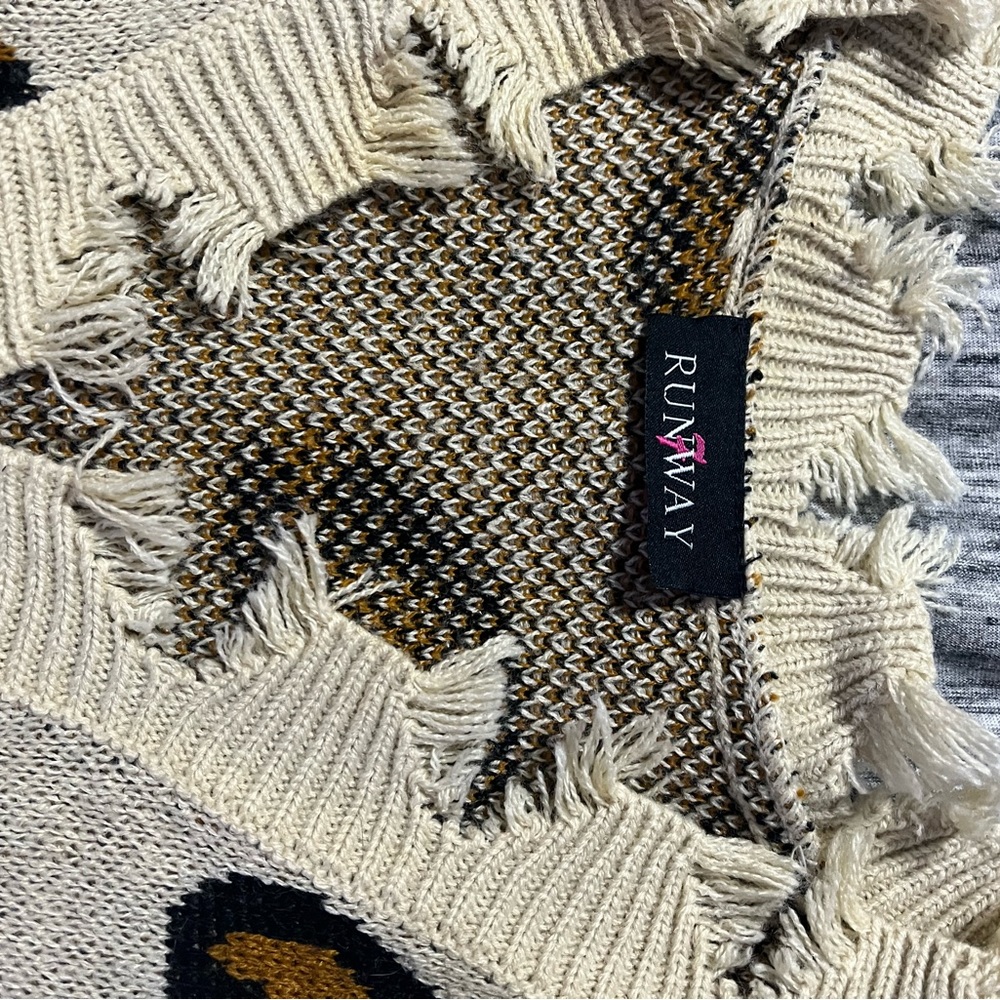 Cheetah distressed sweater size Medium